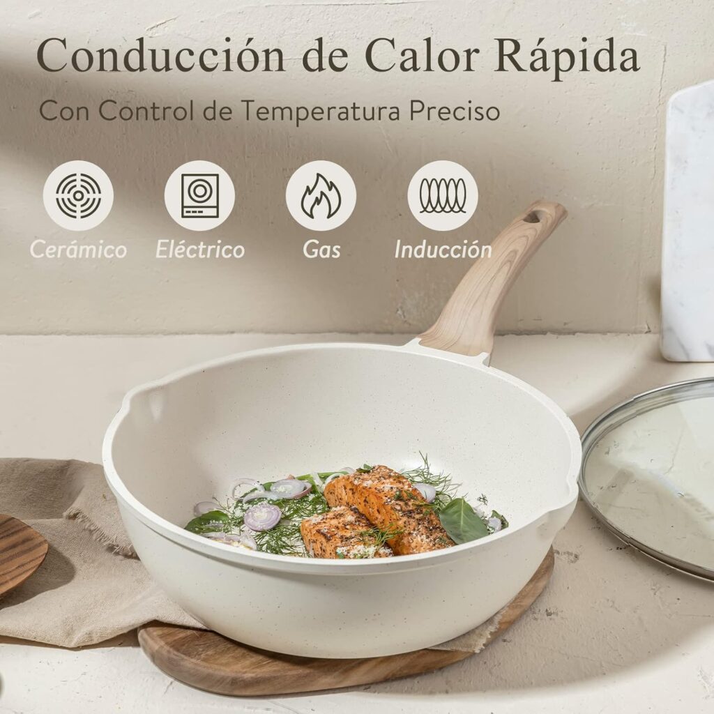 Juego de sartenes CAROTE 14 piezas en granito blanco sobre mesa de cocina